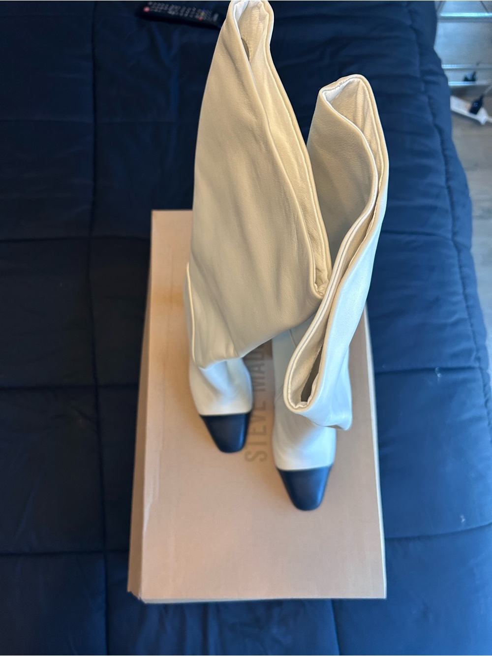 Steve Madden Cream Heeled Boots with Black Cap Toe